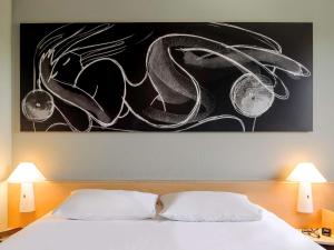 Katil atau katil-katil dalam bilik di ibis Augsburg Koenigsplatz