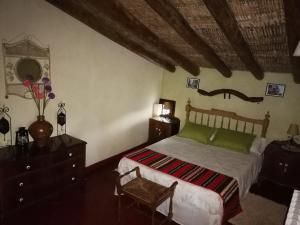 Ένα ή περισσότερα κρεβάτια σε δωμάτιο στο El Sosiego
