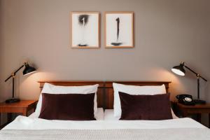 Una cama o camas en una habitación de Hotel Esplanade
