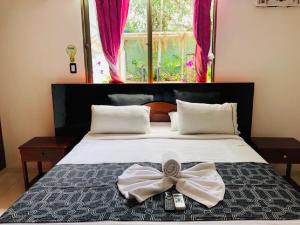 Voodi või voodid majutusasutuse Hotel Yurupary AMAZONAS toas