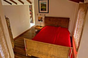 Postel nebo postele na pokoji v ubytování Orosi Lodge
