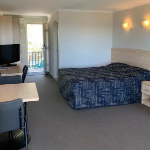 Postel nebo postele na pokoji v ubytování Shellharbour Resort and Conference Centre
