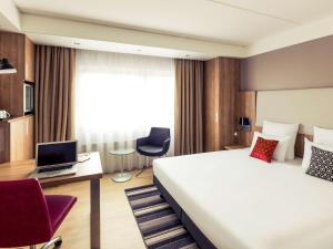 Postel nebo postele na pokoji v ubytování Mercure Hotel Nijmegen Centre