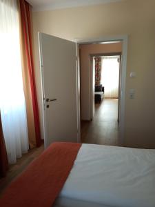Posteľ alebo postele v izbe v ubytovaní Adlerhof