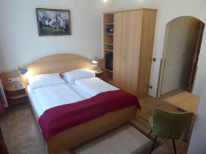 Posteľ alebo postele v izbe v ubytovaní Adlerhof