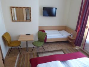 Posteľ alebo postele v izbe v ubytovaní Adlerhof