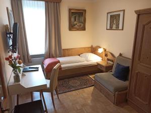 Posteľ alebo postele v izbe v ubytovaní Adlerhof