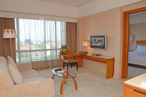 TV o dispositivi per l'intrattenimento presso Dongguan Well Garden Hotel