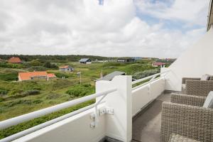 Balkón nebo terasa v ubytování WestCord Strandhotel Seeduyn