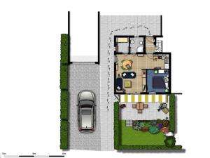 a floor plan of a house with a car at Luett Hues in Scharbeutz