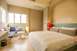 Katil atau katil-katil dalam bilik di City Suites - Taipei Nandong