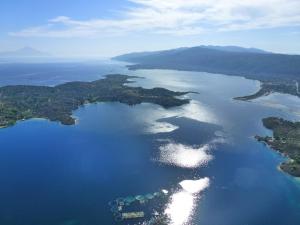 an aerial view of a group of islands in a body of water at Vergos Hotel in Vourvourou