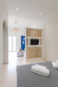 Postel nebo postele na pokoji v ubytování Almiriki Naxos Beachside Living