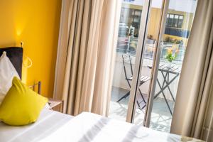 Ένα ή περισσότερα κρεβάτια σε δωμάτιο στο Hotel Oltnerhof - Self Check in