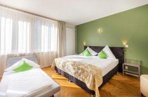 Ένα ή περισσότερα κρεβάτια σε δωμάτιο στο Hotel Oltnerhof - Self Check in