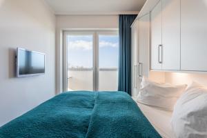 Postel nebo postele na pokoji v ubytování Residenz Am Meer