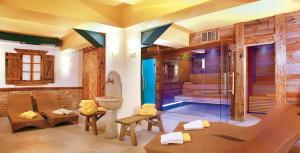 Fotografia z galérie ubytovania Hotel Dolomiti Schloss v destinácii Canazei