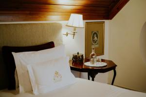 Cama ou camas em um quarto em Challet Fonte Nova