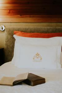 Cama ou camas em um quarto em Challet Fonte Nova