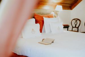 Cama ou camas em um quarto em Challet Fonte Nova