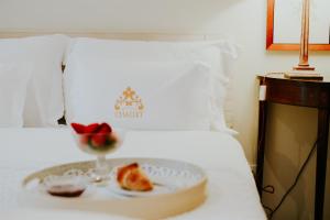 Cama ou camas em um quarto em Challet Fonte Nova