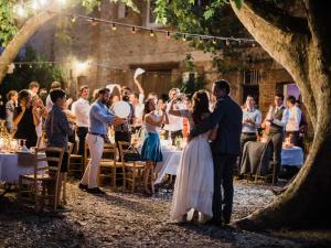 a bride and groom dancing at their wedding reception at Domaine du Mas Bazan in Alénya +146 photos
