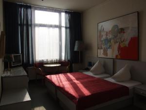 Berlin ART Hotel客房内的一张或多张床位