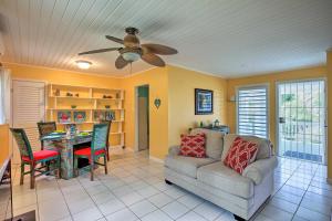 a living room with a couch and a table at St Croix Home with Caribbean Views - 1 Mi to Beach in La Vallee