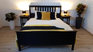 A bed or beds in a room at Le Monde Apartment Bratislava - amazing 5BDR in downtown