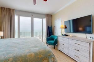 Ένα ή περισσότερα κρεβάτια σε δωμάτιο στο 609 - Island Inn