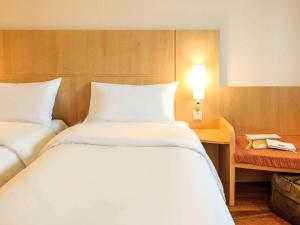 Voodi või voodid majutusasutuse Ibis Wien Messe toas