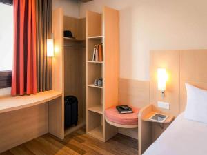 Postel nebo postele na pokoji v ubytování ibis Grenoble Gare