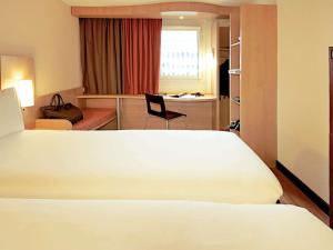 Postel nebo postele na pokoji v ubytování ibis Grenoble Gare