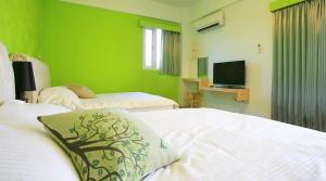 Postel nebo postele na pokoji v ubytování Provence Homestay