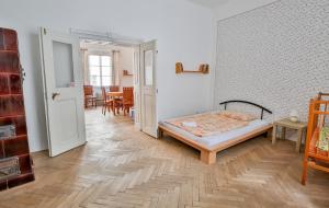 Posteľ alebo postele v izbe v ubytovaní Rodinný hostel Stárkův dům