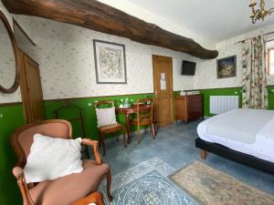 Postel nebo postele na pokoji v ubytování Le clos du Tay