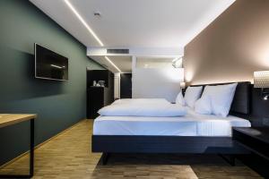 TV o dispositivi per l'intrattenimento presso Montfort - das Hotel