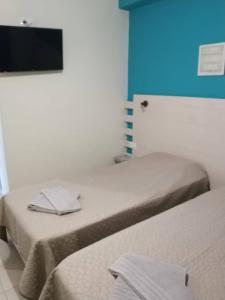 Postel nebo postele na pokoji v ubytování Sokaki rooms