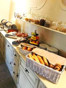 a kitchen filled with lots of different types of food at Hotel Octarna in Kroměříž
