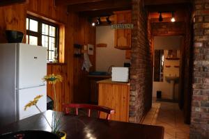 Kuchyň nebo kuchyňský kout v ubytování Myoli Beach Lodge