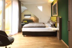 Postel nebo postele na pokoji v ubytování Hotel Adler