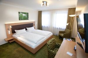 Postel nebo postele na pokoji v ubytování Hotel Adler + 21 fotografií