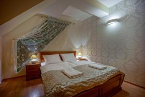 Posteľ alebo postele v izbe v ubytovaní Jawor Pokoje i Apartamenty