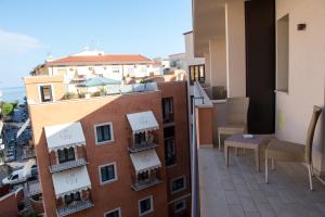 a view of a balcony of a building at Artemis Hotel in Cefalù