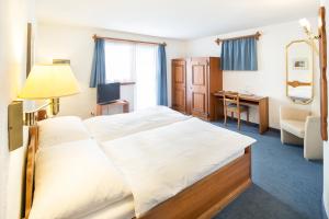 Voodi või voodid majutusasutuse Hotel Dieschen toas