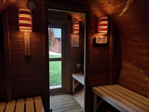 an inside view of a room in a cabin at Domki Krótki Szpic in Istebna +32 photos