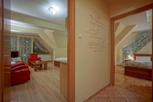 Posteľ alebo postele v izbe v ubytovaní Jawor Pokoje i Apartamenty
