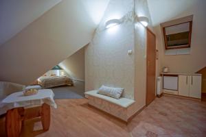 Posteľ alebo postele v izbe v ubytovaní Jawor Pokoje i Apartamenty