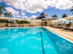 Bazén v ubytování Pullman Reef Hotel Casino nebo v jeho okolí