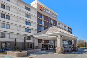 a rendering of the front of a hotel at Comfort Inn University Wilmington in Wilmington